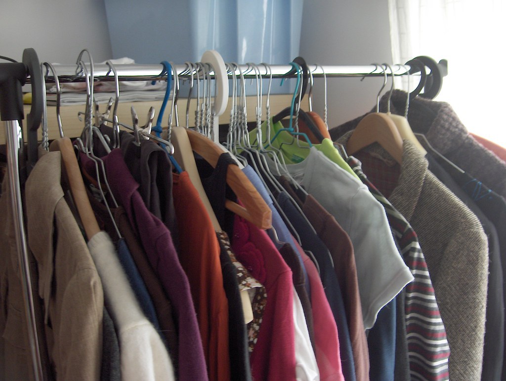 Clothing arranged on a retail rail; illustrative image, not a American Rag product photograph