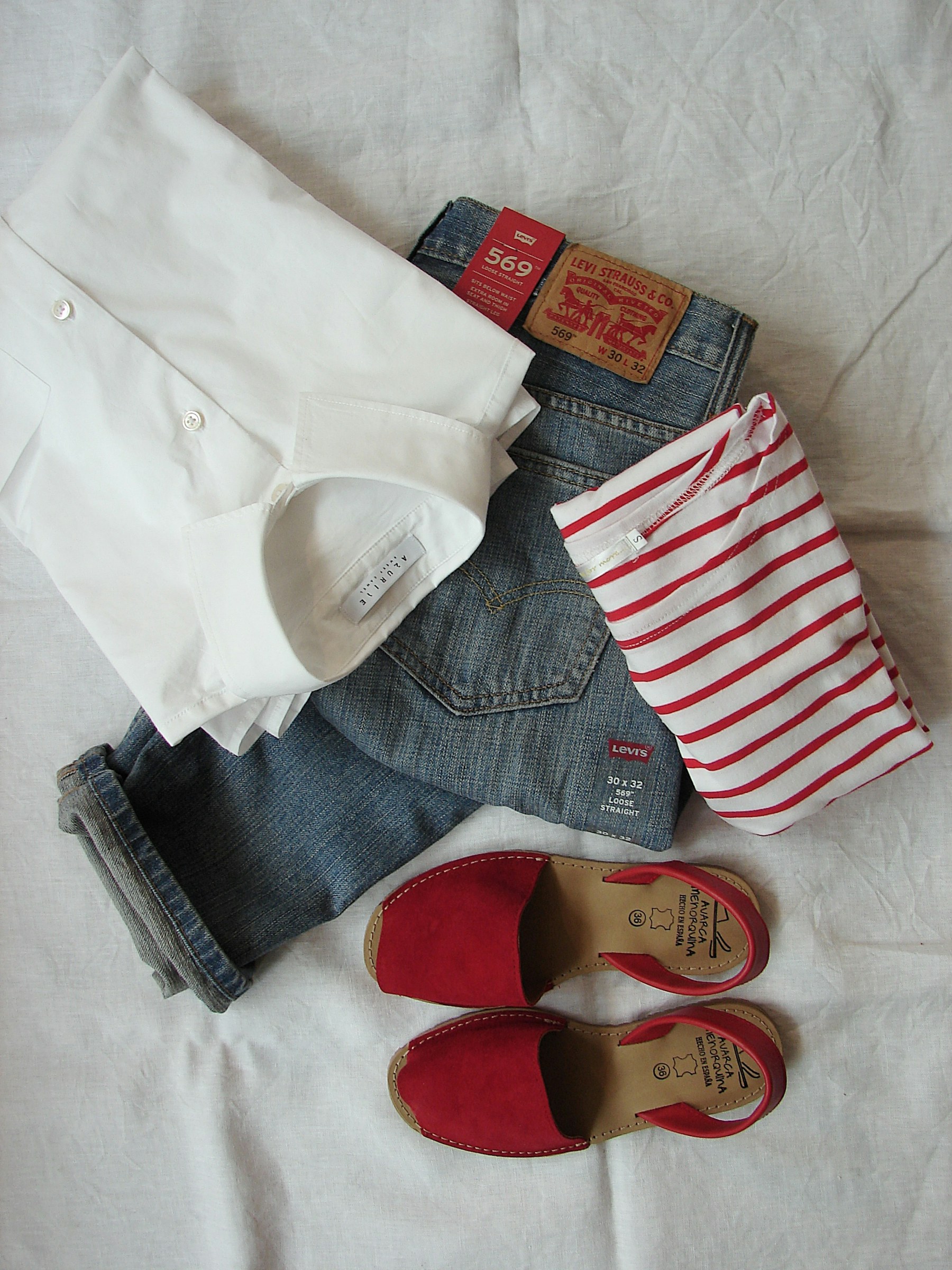 Curated clothing in a bright wardrobe